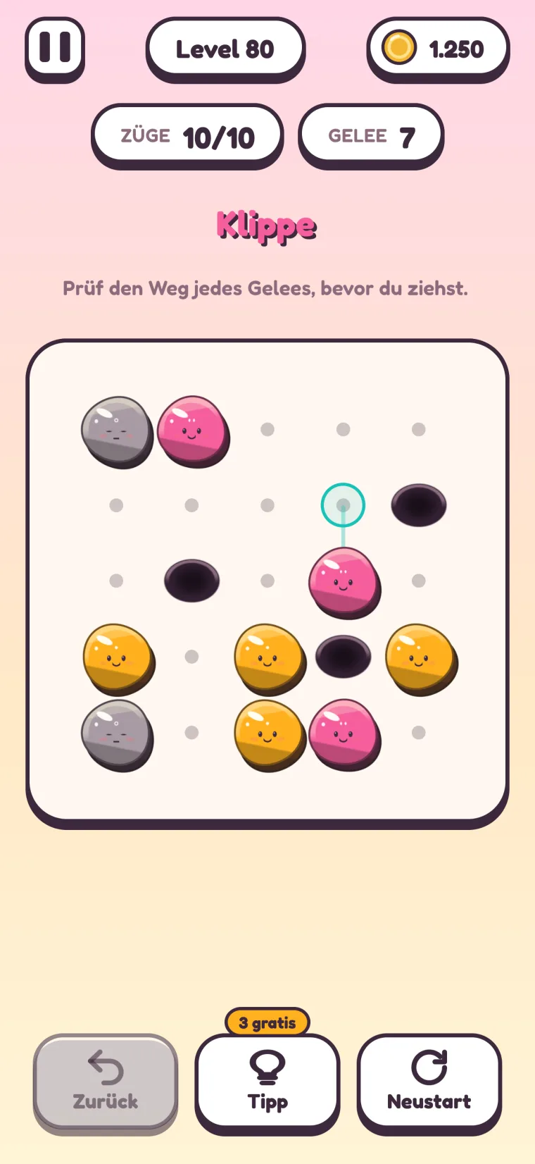 Level 80, „Klippe“ („Prüf den Weg jedes Gelees, bevor du ziehst.“): Drei schwarze Löcher auf einem 5×5-Spielfeld, ringsum graue, pinke und orangefarbene Gelees, über einem pinken Gelee ein gewählter Ziehpunkt.