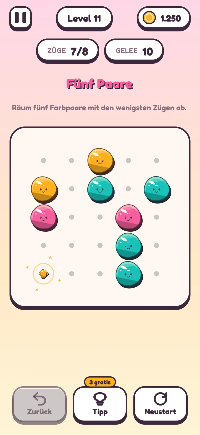 Level 11, „Fünf Paare“ („Räum fünf Farbpaare mit den wenigsten Zügen ab.“): Auf dem Punkt unten links platzen verschmolzene orangefarbene Gelees in einem Funkenregen; orangefarbene, türkisfarbene und pinke Gelees warten noch auf dem Spielfeld.