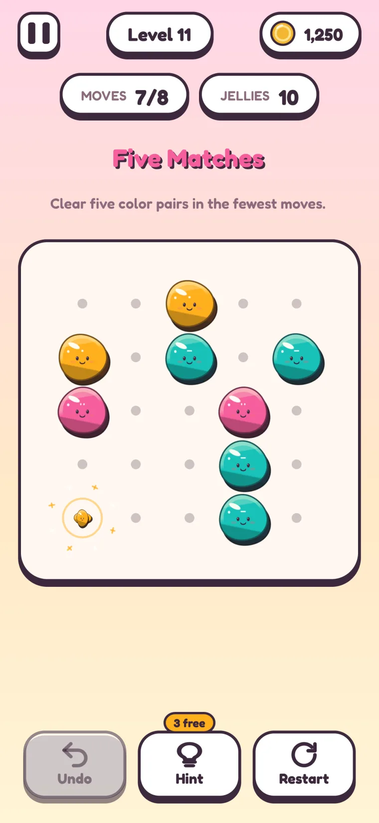 Level 11, Five Matches: an orange merge popping in a burst of sparkles on the bottom-left point, with orange, teal and pink jellies still waiting on the board.
